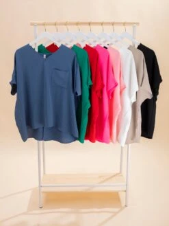 Zenana Airflow V-Neck Dolman Short Sleeve Top With Pocket -Discount Divas Shop 11cdbc568811c7ca8aeeea03c509b6f0