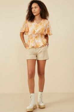 Textured Floral Smocked V-Neck Peplum Top | S-L Hayden