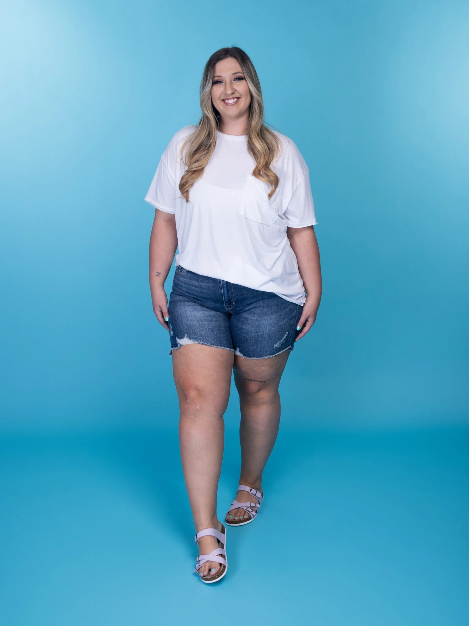 Judy Blue Mid-Rise High Low Cut Destroyed Hem Shorts | S - 3XL 1 Judy Blue Mid-Rise High Low Cut Destroyed Hem Shorts | S - 3XL